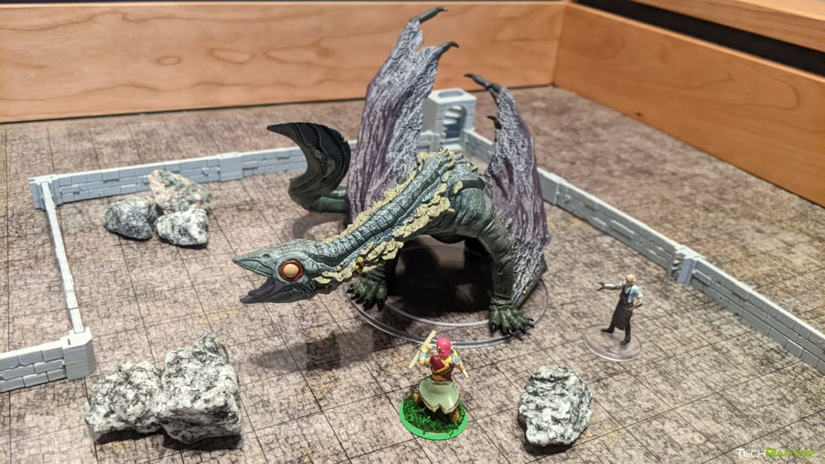 The Adult Deep Dragon for Dungeons & Dragons from Wizkids in a mock battle