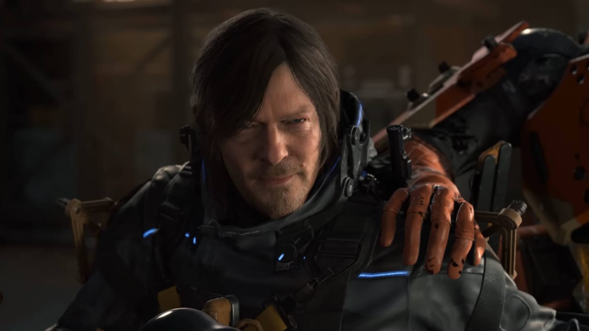 Sam Porter-Bridges with a mechanical hand on his shoulder in Death Stranding 2