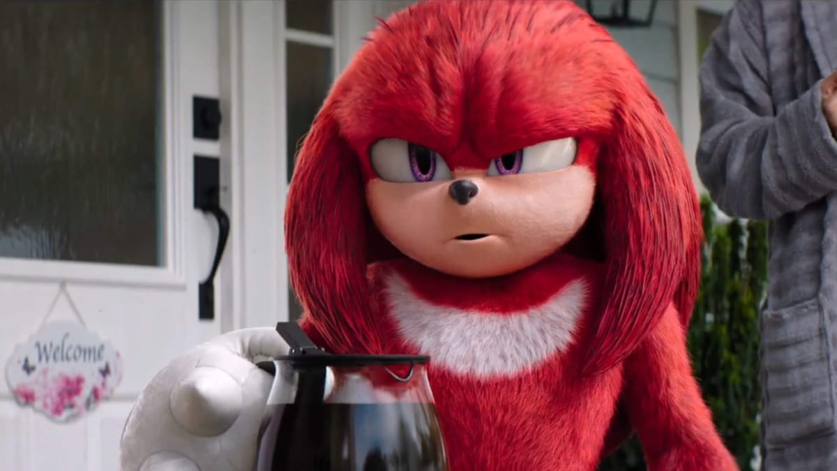 Knuckles in the new live-action series holding a pot of coffee