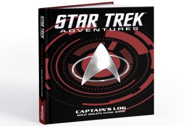 A screenshot of the hardcover of Star Trek Captain's Log Solo Roleplaying Game, featuring the artwork and combadge from Star Trek: The Next Generation.