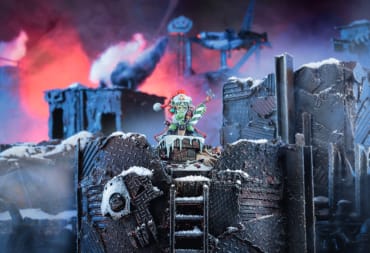 A screenshot of Da Red Gobbo unit, sitting on top of a gray iron Ork battlement.